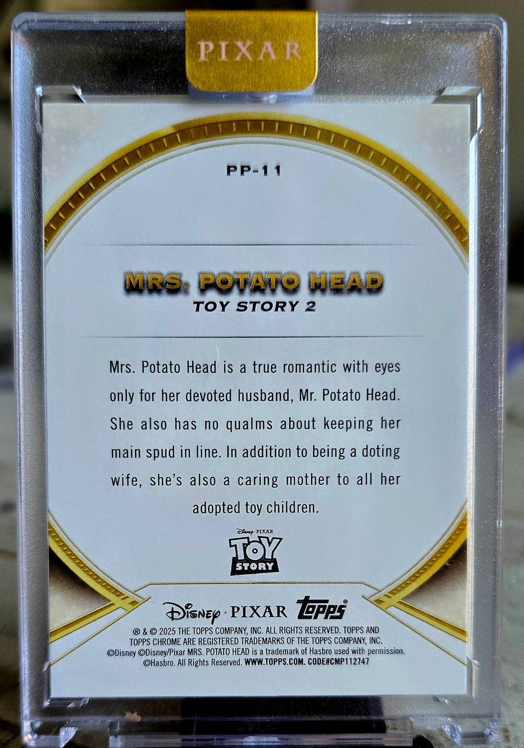 2025 Topps Pixar Gold - Mrs. Potato Head - Encased Perfections Insert 063/100